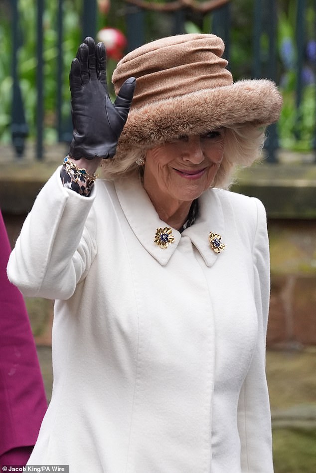 Queen Camilla waves as she leaves the Royal Maundy service at Worcester Cathedral today