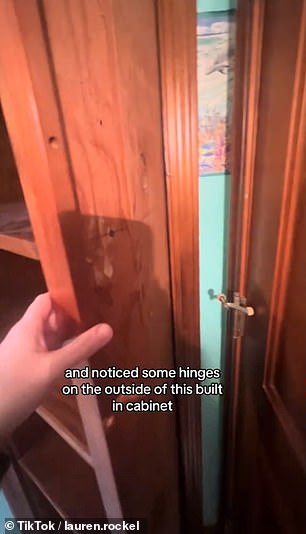 He discovered the hidden entrance when he saw visible hinges on the outside of a bathroom cabinet.