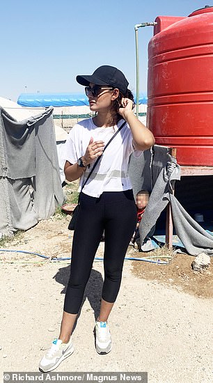 Begum was spotted in the camp sporting a more westernized look with Nike trainers and Primark leggings.