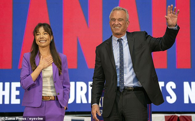 Independent presidential candidate Robert F. Kennedy Jr. (right) announced his vice presidential pick, Bay Area businesswoman and attorney Nicole Shanahan (left) during a rally Tuesday in Oakland, California.