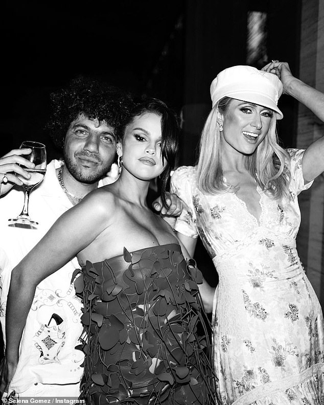 In July, Benny attended Selena's 31st birthday party, with his arm seductively around her waist while he stood behind her;  seen at her party, which also included guest Paris Hilton.