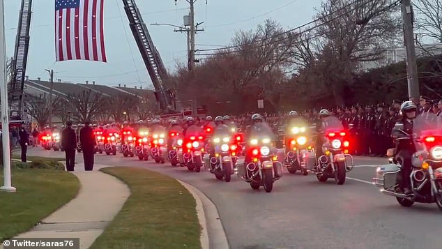 Hundreds of police also lined the streets as Diller's body was taken to the Massapequa funeral home on Wednesday.