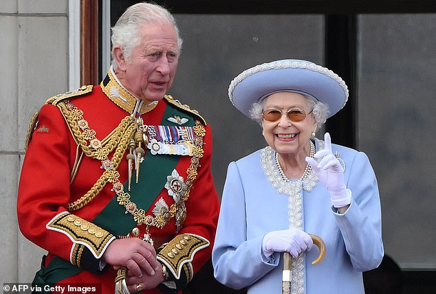 Pictured: Elizabeth and her son Charles on the balcony of Buckingham Palace after the Queen's birthday parade, Trooping the Colour, in June 2022.