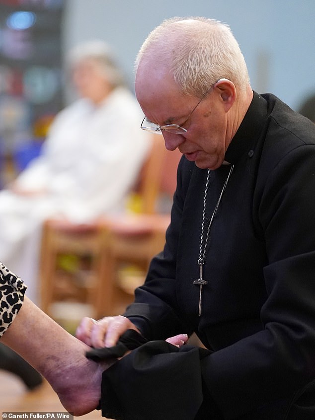 The Archbishop performs the washing of the feet on Holy Thursday, the eve of Good Friday