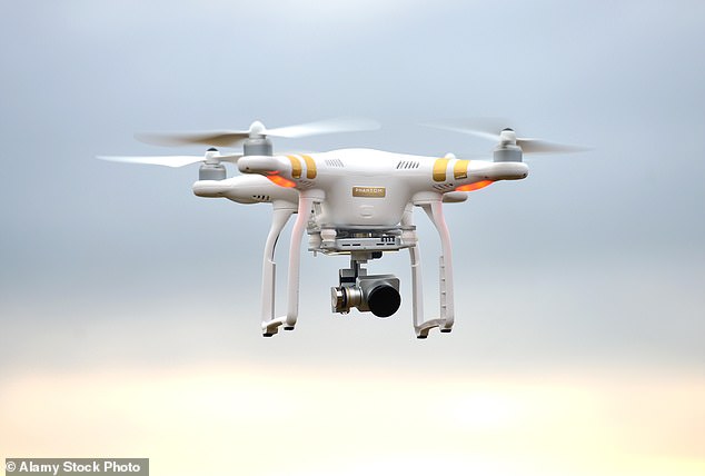 A remote-controlled drone in flight. The incident is believed to be one of the closest crashes between a BA plane and a drone (file image)