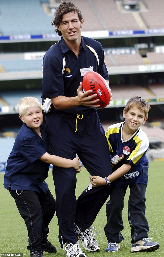 Thompson, 46, from Kyneton, 86 kilometers from Melbourne, bought the Macedon Rangers farmland property nine years ago and now plans to downsize, the Herald Sun reports. Pictured: Thompson and some young fans in 2003.