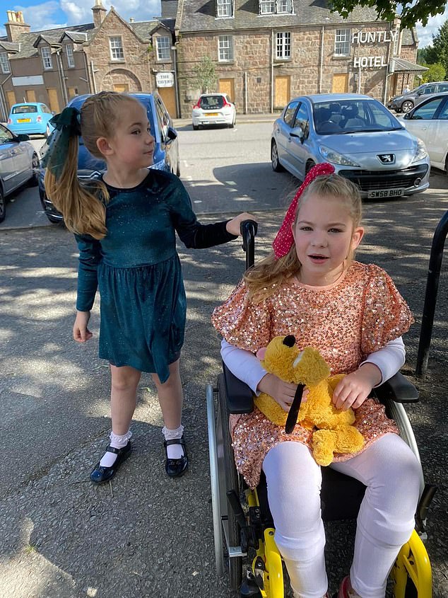 Lisa Boyd's nine-year-old daughter Lily Nicolson (pictured), who has cerebral palsy and uses a wheelchair, was also omitted from one of the class photographs, along with another child.