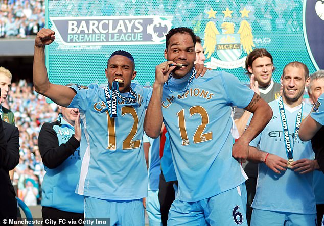 Clichy, pictured here with Joleon Lescott, won the Premier League title twice with Manchester City.