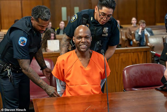 At an arraignment hearing Thursday in New York State Supreme Court, Martin flashed a smile while wearing a bright orange jumpsuit.