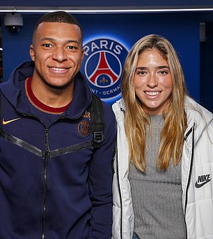 Albert poses with star Kylian Mbappé while playing for PSG in France