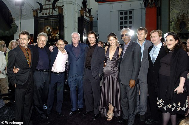 The couple appear at the premiere of Batman Begins in Los Angeles Premiere with, from left, Gary Oldman, Charles Roven, producer, Jeff Robinov of Warner Bros., Michael Caine, Christian Bale, Katie Holms, Morgan Freeman, Liam Neeson, Christopher Nolan.  director and emma thomas