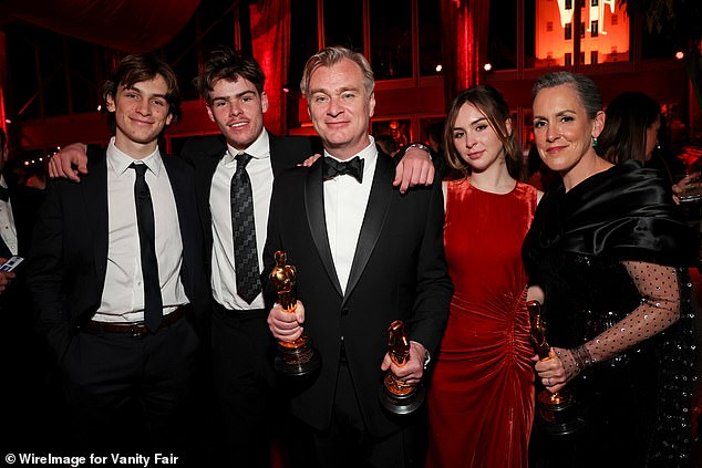 Christopher and Emma shared four children, including Rory (far left), Oliver (left), and Flora (right) (seen at the 2024 Vanity Fair Oscar Party)