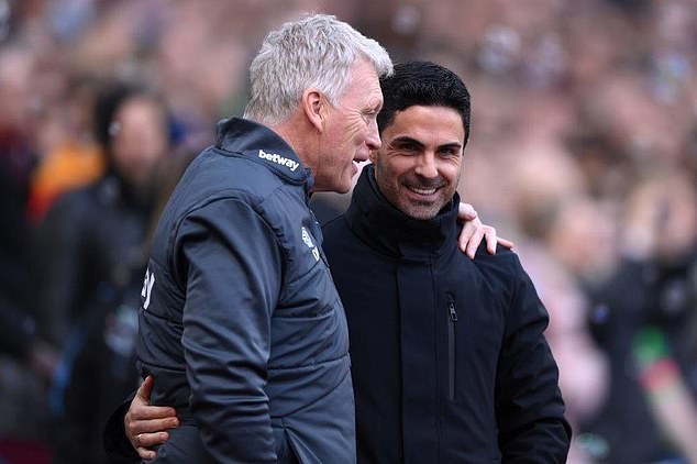 Arteta, now in charge in north London, greets his former Everton manager David Moyes