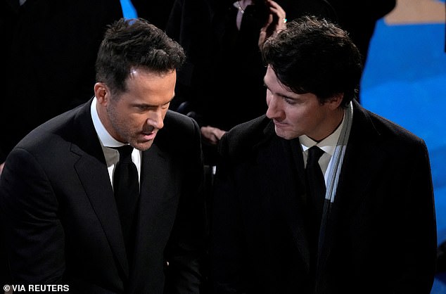 Canadian Prime Minister Justin Trudeau speaks with actor Ryan Reynolds at the funeral of former Prime Minister Brian Mulroney in Montreal.