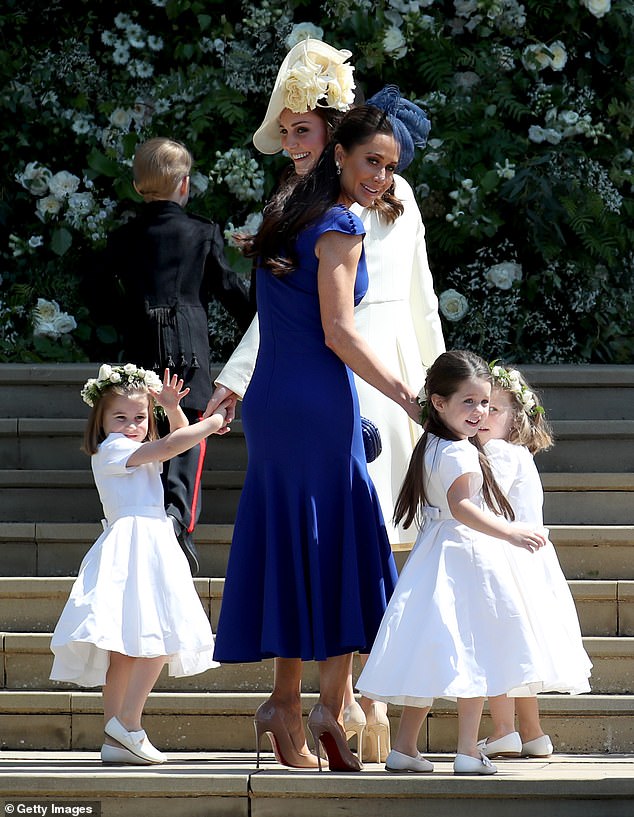 Mulroney with her daughter Ivy, Princess Charlotte, Florence van Custem and the Princess of Wales at Meghan and Harry's 2018 wedding at Windsor Castle.