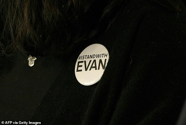 Danielle Gershkovich, sister of detained journalist Evan Gershkovich, wears a pin that says #IStandWithEvan