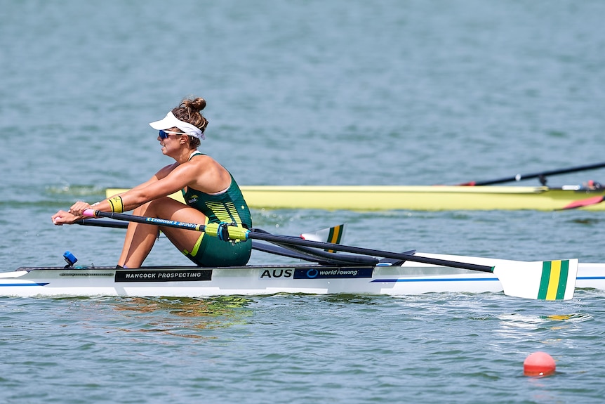 Rower Tara Rigney is rowing in a single sculls event. 