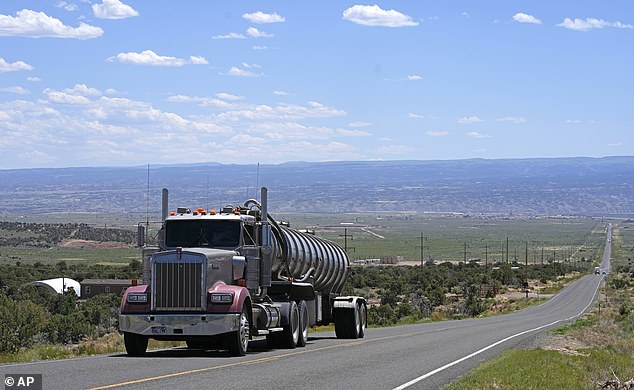 A tanker truck transports crude oil on a highway near Duchesne, Utah, on July 13, 2023.
