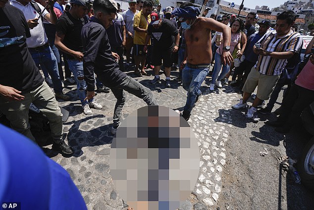 1711756775 241 Mexican mob drags woman suspected of killing eight year old girl out