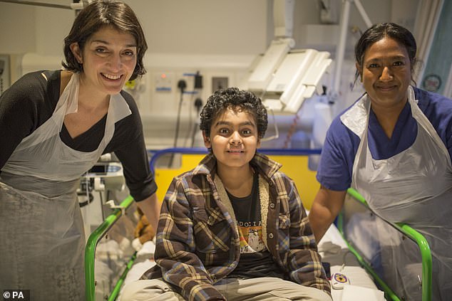 Yuvan Thakkar, 16, from Watford (centre), was the first child in the UK to benefit from a pioneering CAR T therapy called Kymriah, thanks to CDF.