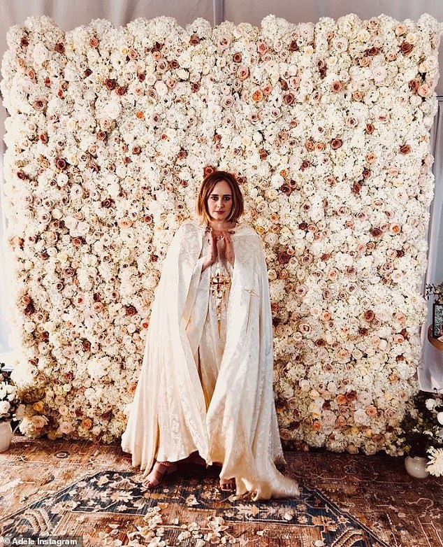 Adele paid for her wedding, which took place at the singer's home in California and the star was ordained for the occasion, sharing a photo of herself in front of a huge wall of flowers.