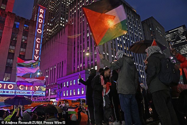 Palestinian flags flew outside New York City's Radio City Music Hall, site of President Joe Biden's $25 million fundraiser with former presidents Barack Obama and Bill Clinton.