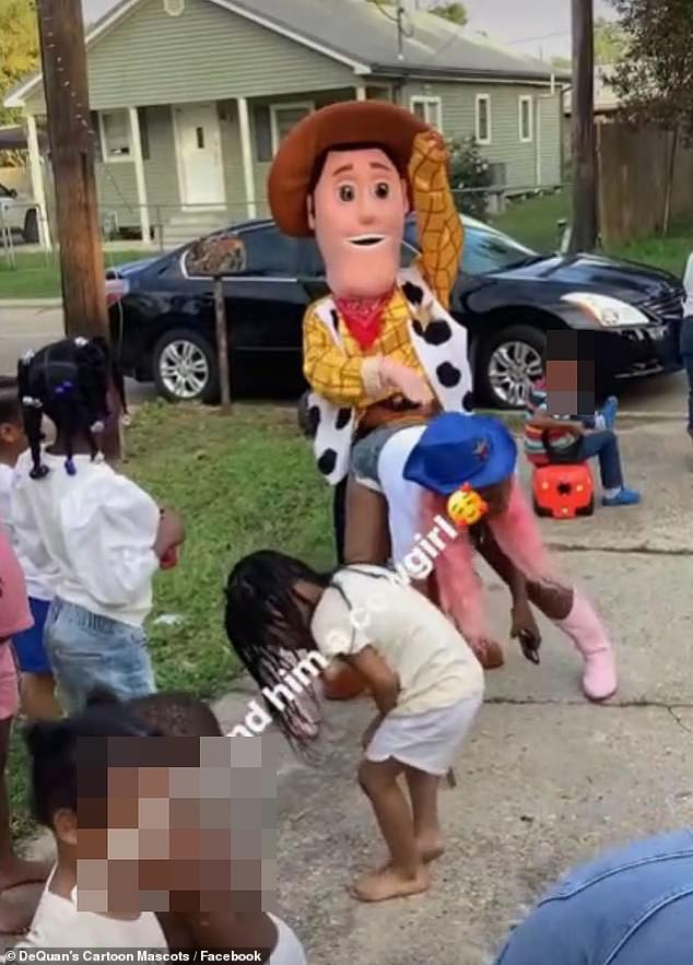 Meanwhile, huge Woody had fun as a woman leaned over and twerked on him.  Woody waved her arm in the air and repeatedly slapped the dancer's butt.