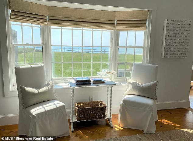 This bay window is a cozy place to sit while admiring the ever-increasing sea views.