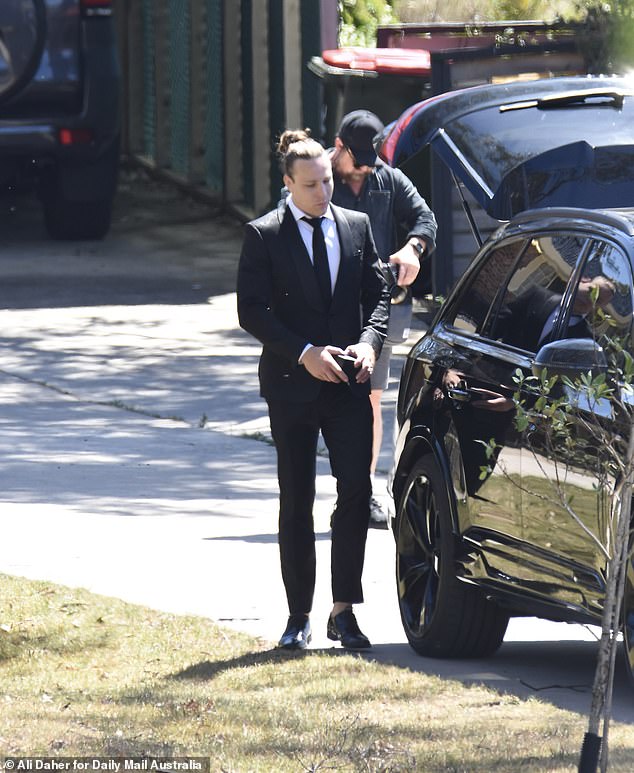 Elsewhere, Jayden Eynaud was seen looking dapper in a black tuxedo as he left a rental property in western Sydney.