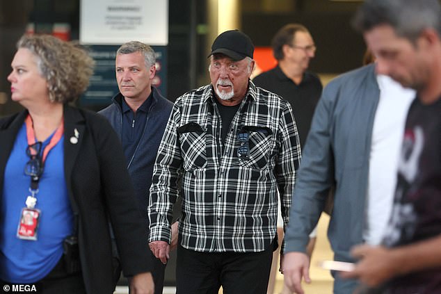 Tom looked a little tired as he walked through the terminal before his performance at BluesFest, which attracts more than 100,000 music lovers.