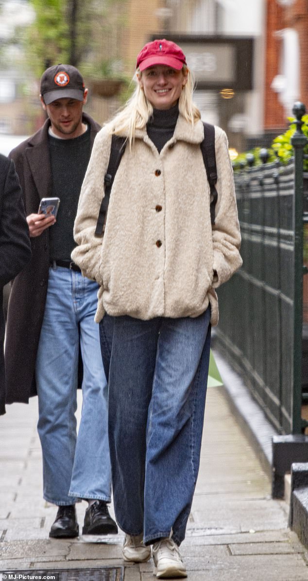The couple were seen smiling as they walked through Marylebone, before catching the tube.