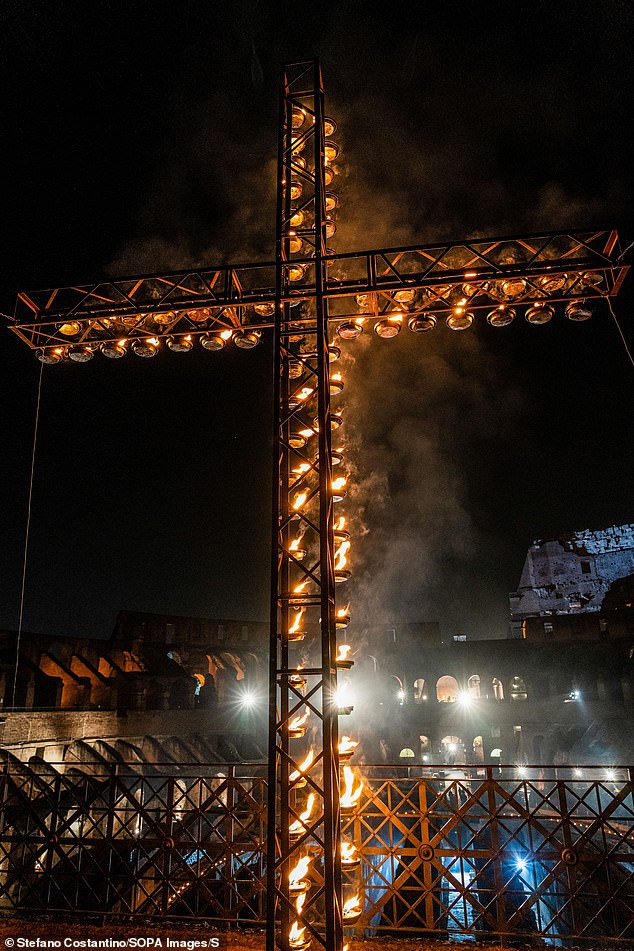 The Via Crucis at the Colosseum is a re-enactment of Jesus' death by crucifixion, in which participants take turns holding the cross as they walk in and around the ancient Roman arena, stopping to pray and listen to meditations.
