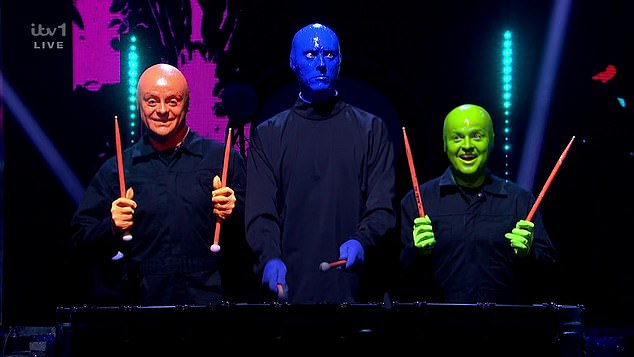 While Ant was slathered in orange body paint, Dec opted for green, with some fans comparing him to Jim Carey in the 1994 film The Mask, as they performed with the iconic blue musical group.