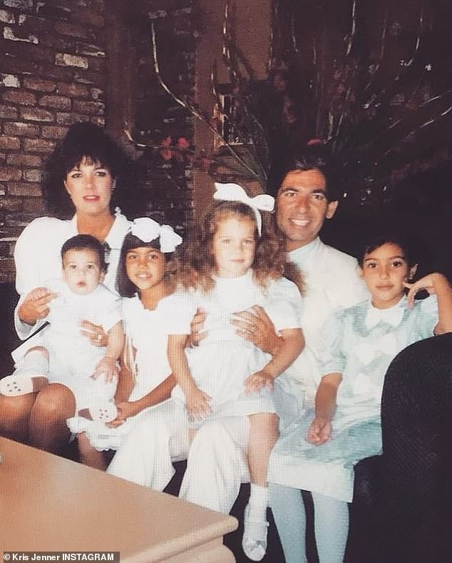 Several include photos with her late ex-husband Robert Kardashian, who died in 2003.