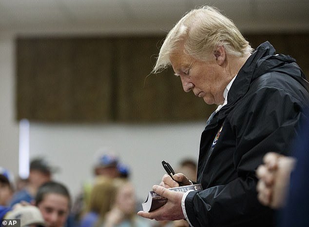 In 2019, Trump appeared in Alabama where he signed Bibles after devastating tornadoes.