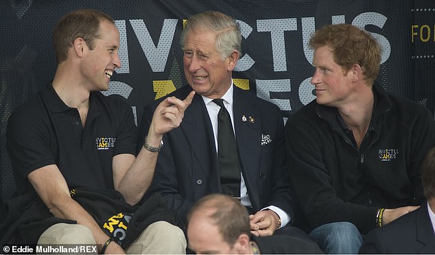 Prince William, Prince Charles and Prince Harry watching athletics at the inaugural Invictus Games, at the Lee Valley Athletics Center on September 11, 2014.