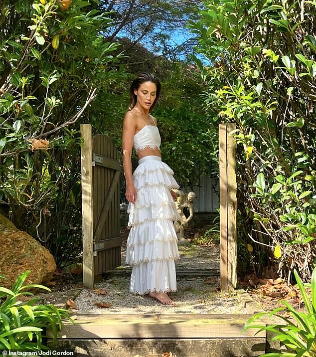 The former Home and Away star, 39, posed up a storm in her garden as she took advantage of the long weekend to relax in the mild weather.
