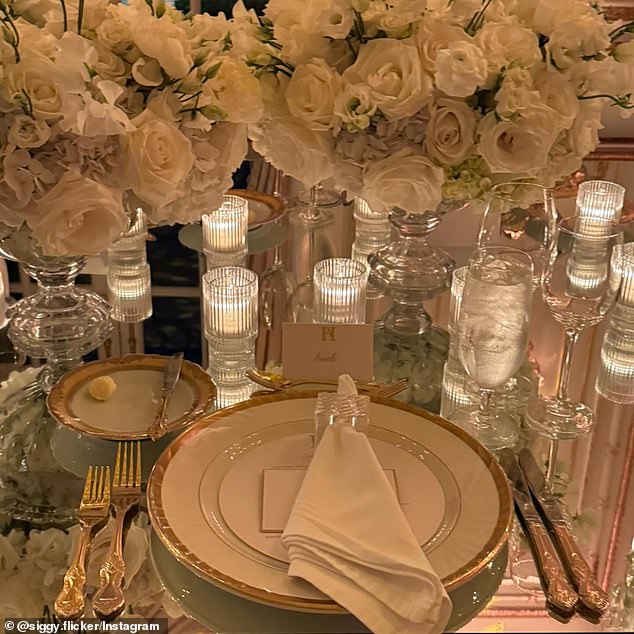 Others showed off the stylized glassware on the event table, where guests likely enjoyed a feast fit for a Republican king and queen.