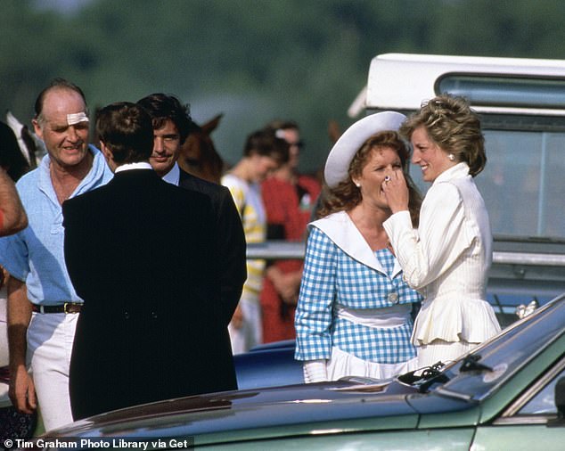 Diana laughs and jokes with Sarah Ferguson at the Guards Polo Club.  Oliver Hoare is in front of the camera, in the center, next to Major Ronald Ferguson.