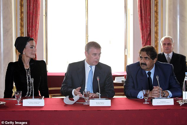 The Emir of the State of Qatar, Sheikh Hamad bin Khalifa Al-Thani, and his wife, Sheikha Mozah, sit with Prince Andrew, Duke of York, at a meeting of industry leaders at Buckingham Palace in 2010 .