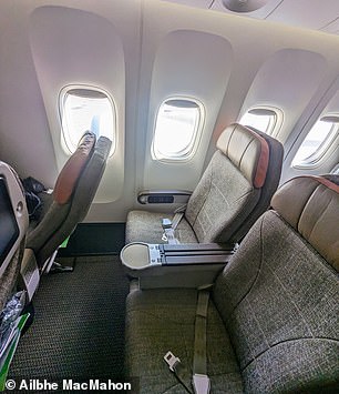 Premium economy seats measure 38 inches (97 cm) long and 19.5 inches (50 cm) wide.