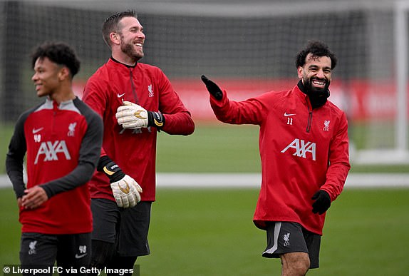 KIRKBY, ENGLAND - MARCH 28: (SUN, SUN SUNDAY) Liverpool's Adrian and Mohamed Salah during a training session at the AXA Training Center on March 28, 2024 in Kirkby, England. (Photo by Andrew Powell/Liverpool FC via Getty Images)