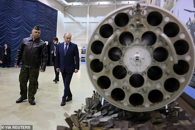 About 65 percent of respondents said they believed Trump would make it through an hour-long meeting with Russian strongman Putin (seen here visiting a Russian Defense Ministry facility in the city of Torzhok), while only 43 percent percent said the same about Biden.