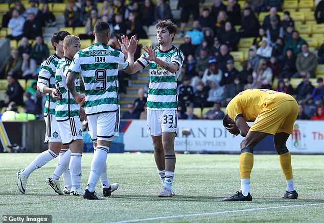Matt O'Riley added a third for Celtic in the dying minutes as the visitors moved to the top of the table.