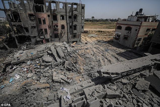 View of a house destroyed after an Israeli airstrike, in the Al Maghazi refugee camp, in the southern Gaza Strip, on March 31.