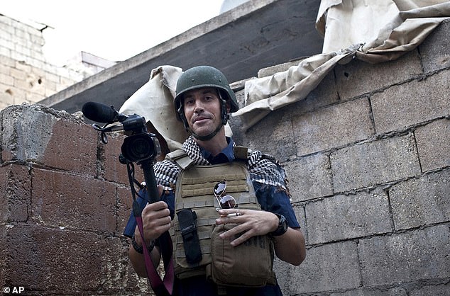 In this file photo from November 2012, journalist James Foley is seen covering the civil war in Aleppo, Syria. He was kidnapped days later when he was leaving the country for Türkiye.