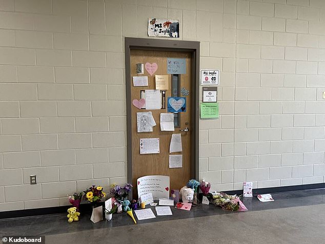 Tributes posted outside Ashley Smylie's classroom door at Northwest Rankin High School