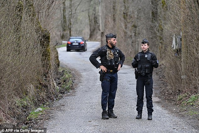 The restrictions remain in place while police gather more information about the remains found Saturday.  Officers are seen stationed on the Le Haut-Vernet road on Sunday.