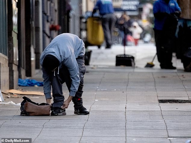 The photo above shows a person on the streets of San Francisco, which has seen an increase in drug overdoses.