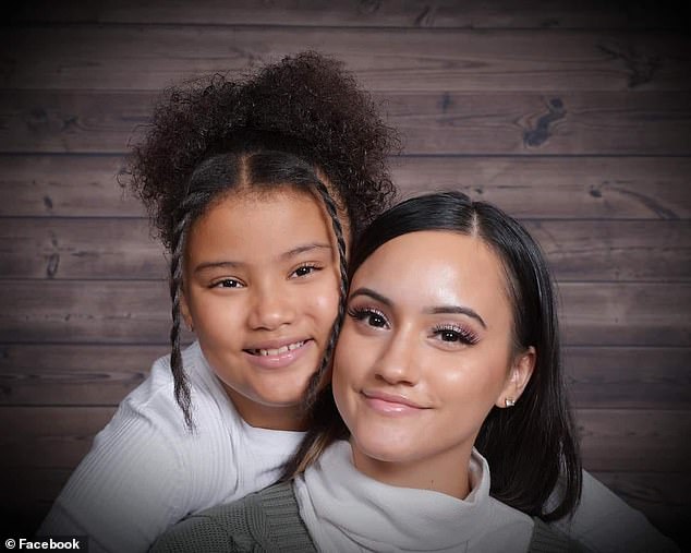 A National Guard woman 27 and her daughter 11 are